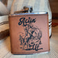 Rawhide 6 oz. Western leatherette stainless steel flask - "Actin' Up"